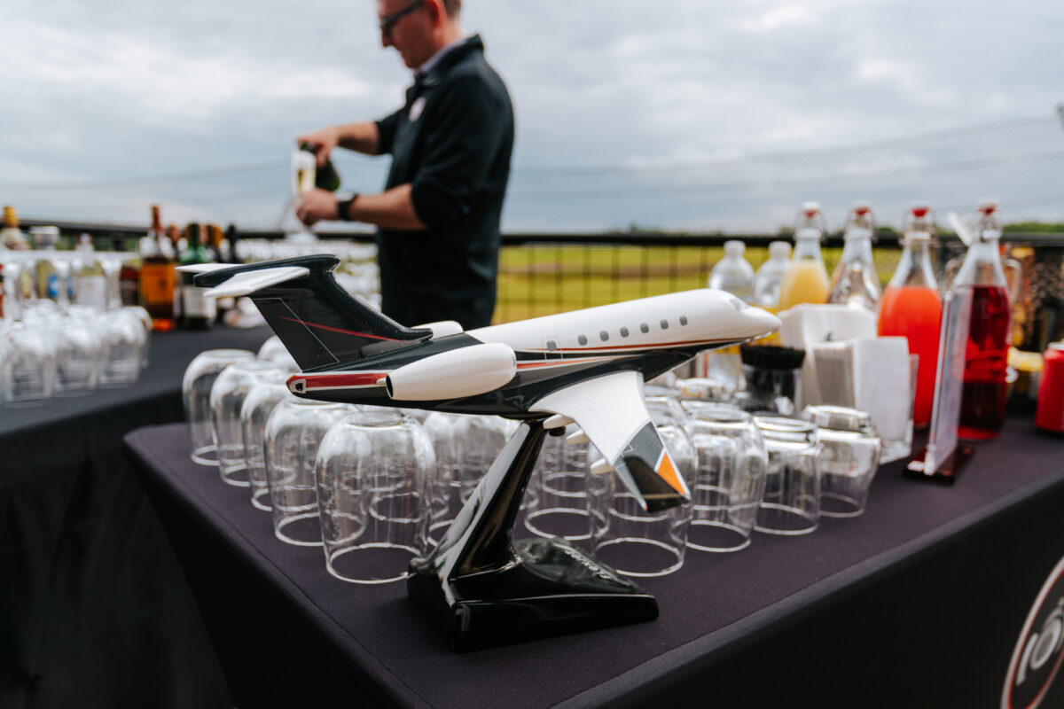 a model airplane on display on a bar for an event